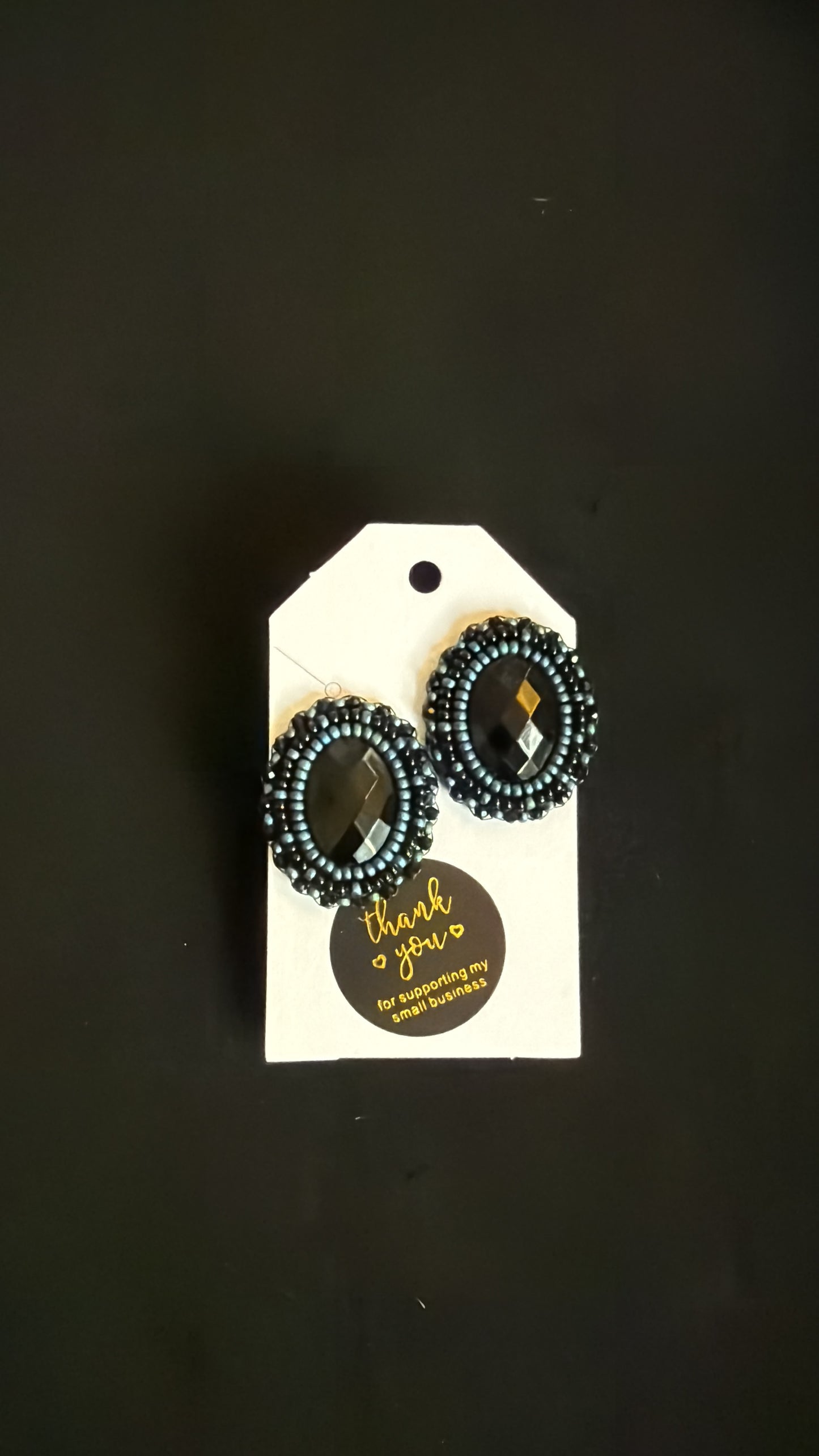 Black and blue stud earrings