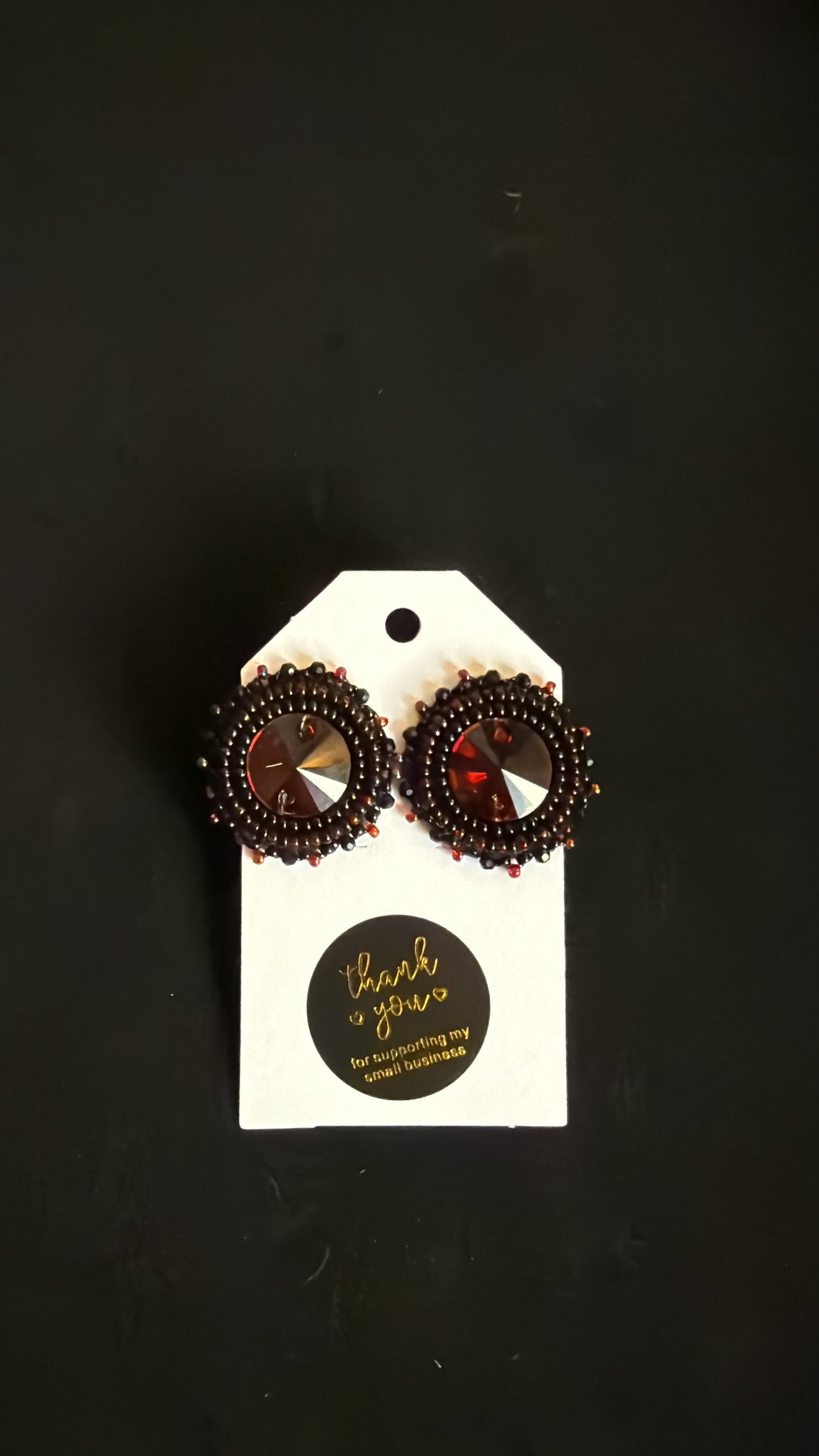 Black and garnet stud earrings