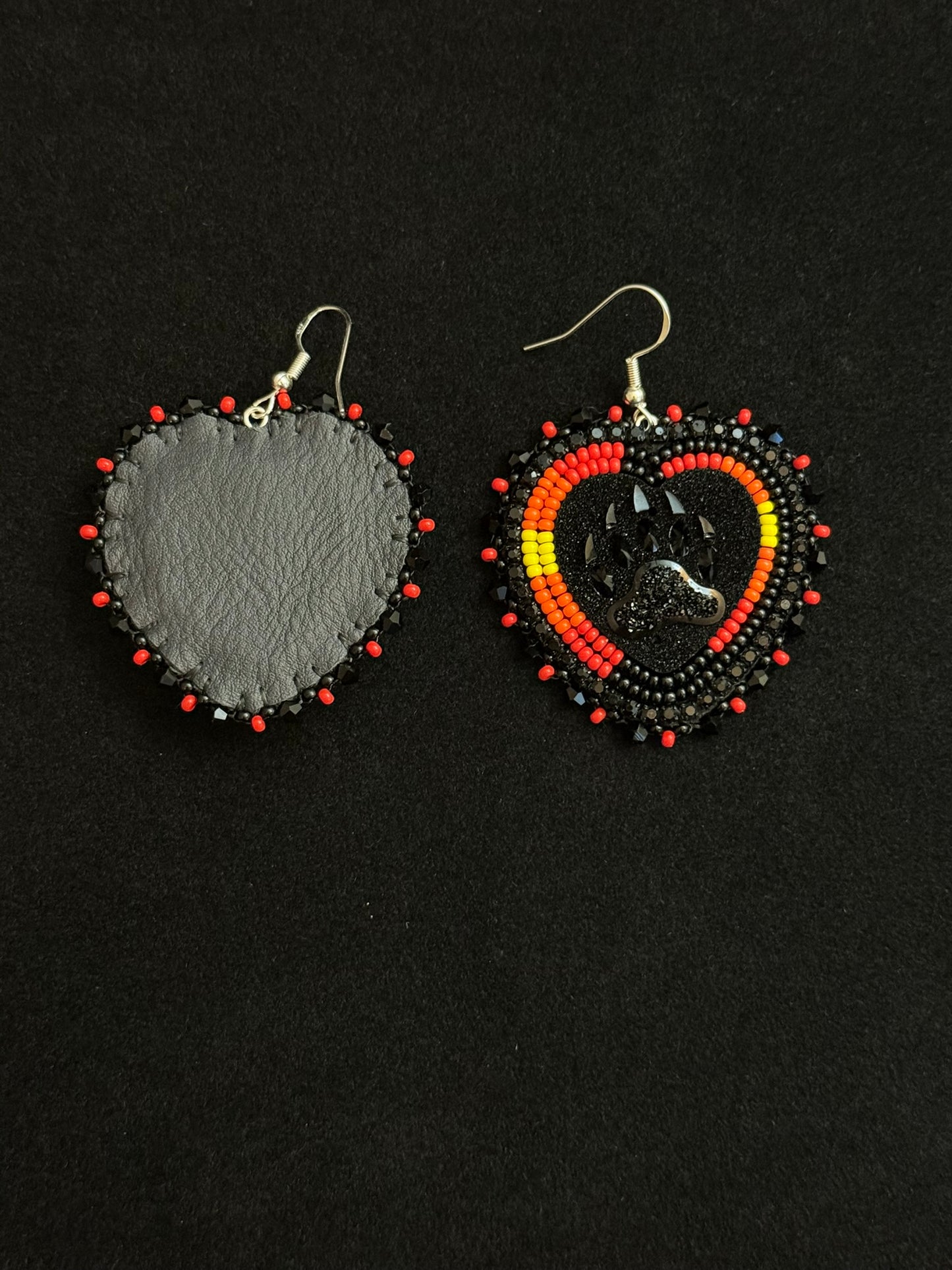 Black hearts with fire colors